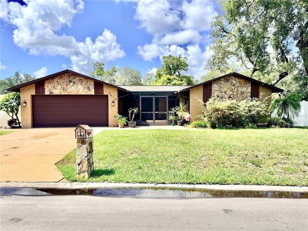 7616 LAUREL OAK COURT